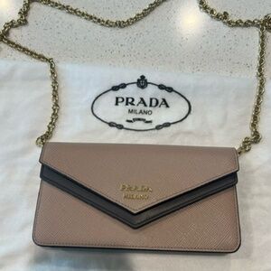 well-loved Prada wallet on chain in MINT CONDITION